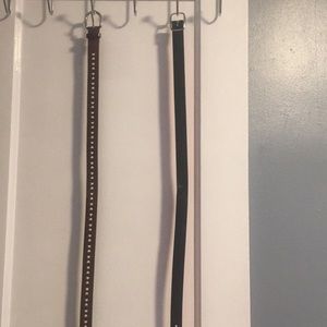 a black / pink reverse able belt
